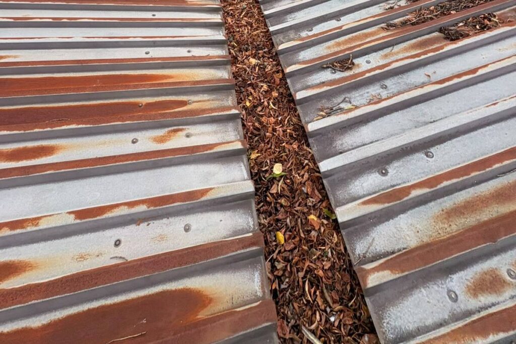 blocked warehouse guttering